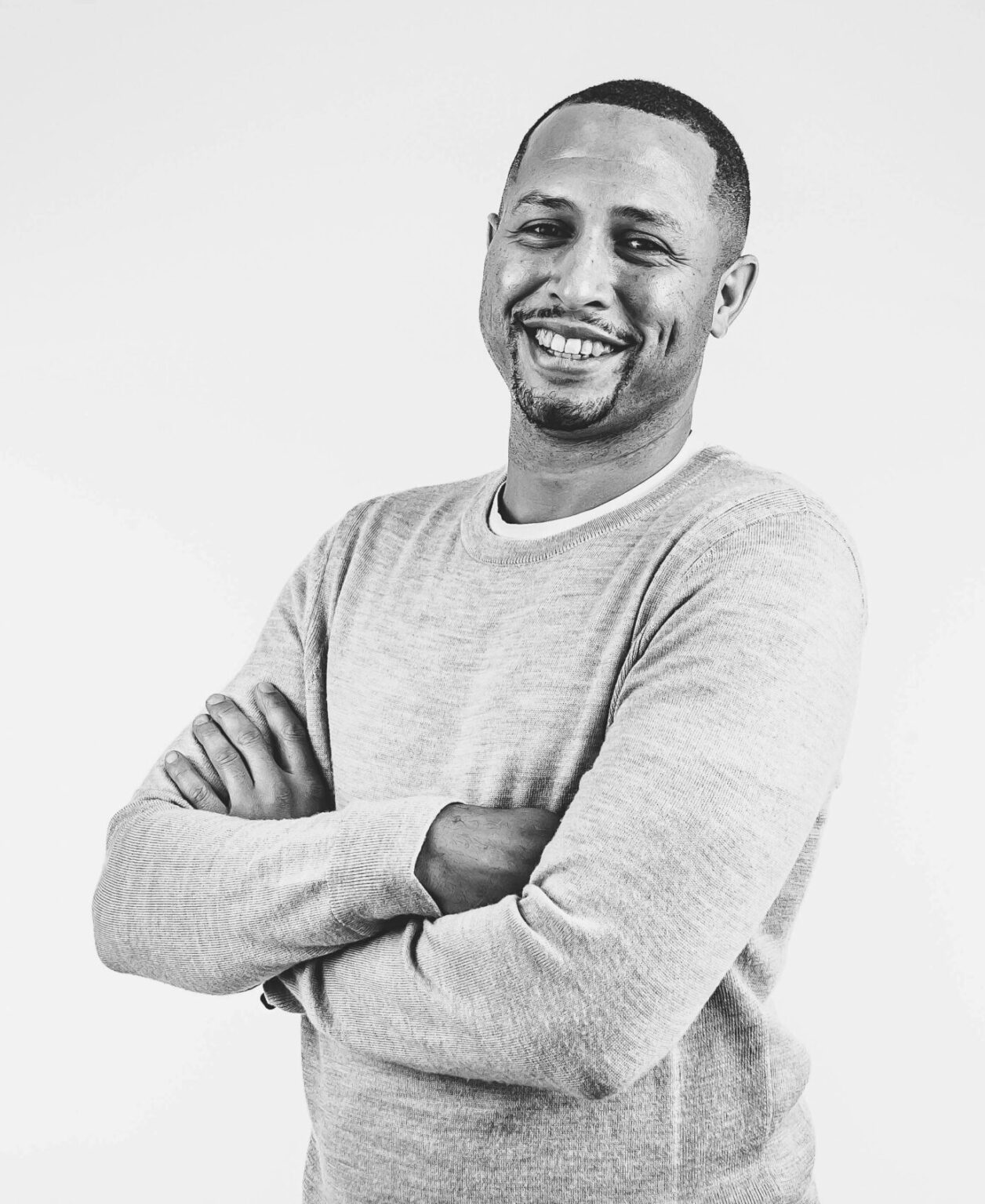 Picture of host of Record in Progress in black and white.